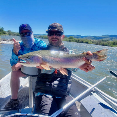 Montana fly fishing guide Cody with a madison river rainbow trout