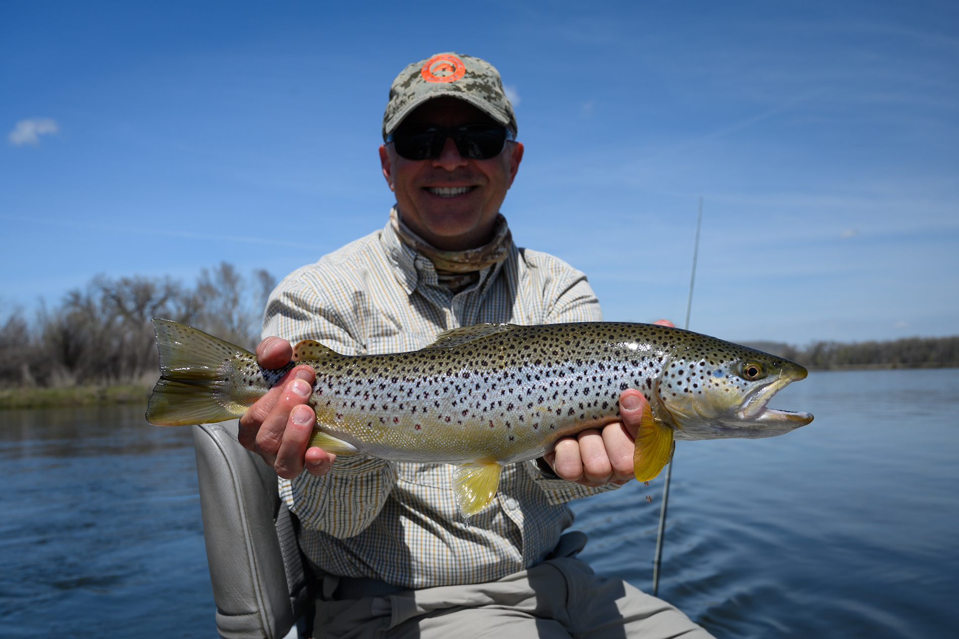 Angler with Brown trout on the Missouri River