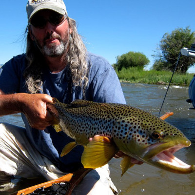 Montana fly fishing guide Nathan Anderson with trout