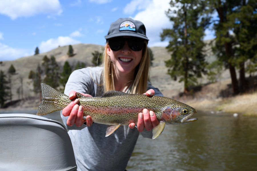 Angler with rainbow trout on Montana's Blackfoot River