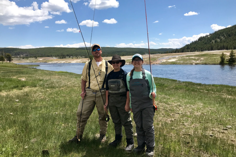 Family fly fishing in Montana