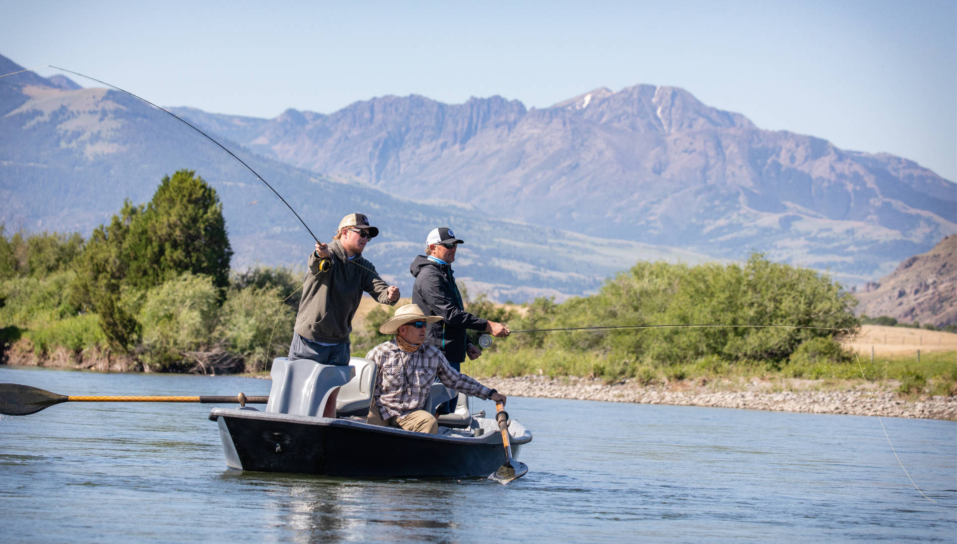 Angler float fishing on a river in Montana