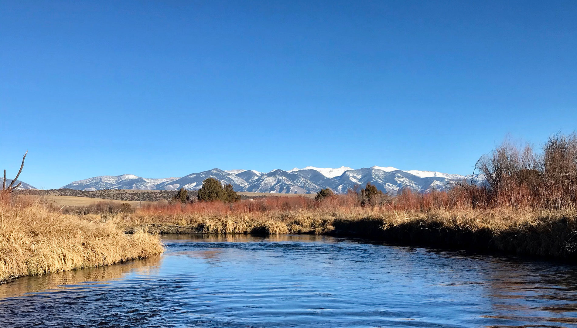 gallatin river with mountains in background