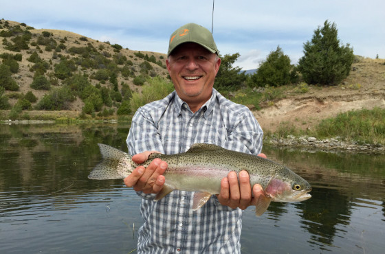 angler with rainbow trout in Montana